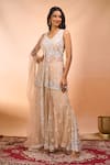 Alaya Advani_Beige Net Embroidery, Beads V-neck Floral Hand Peplum Kurta Sharara Set _at_Aza_Fashions