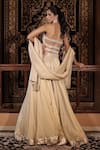 Shop_Vana Ethnics_Ivory Tissue Mirrors, Pearls, The Sitara Spark Embellished Corset Lehenga Set _at_Aza_Fashions