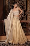 Vana Ethnics_Ivory Tissue, Silk Zari, Sequins, Beads The Roopmati Zardozi Work Lehenga Set _at_Aza_Fashions