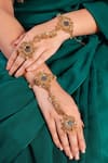 Buy_Vaidaan_Gold Plated Mirrors, Beads Amulya Embellished Haathphool _at_Aza_Fashions