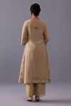 Shop_Label Shreya Sharma_Beige Chanderi Embroidery V-neck Sagarika Thread Placement Kurta Set _at_Aza_Fashions