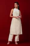 Buy_Label Niyami_Ivory Tissue Beads, Mirrors, Embroidery Halter Neck Hand Kurta With Pant _at_Aza_Fashions
