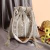 Buy_Nazaakat By Samara Singh_White Beads, Sequins, Mirrors, Tassels Beaded And Embellished Potli Bag _at_Aza_Fashions