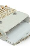 The Tan Clan White Beads, Pearls, Tassels Jena Embellished Flapover Bag Online at Aza Fashions The Tan Clan_White Beads, Pearls, Tassels Jena Embellished Flapover Bag _Online_at_Aza_Fashions