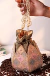 Buy_The Tan Clan_Multi Color Beads, Pearls, Stones, Tassels Juhi Lotus Potli With Handle _at_Aza_Fashions