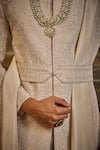 Nitika Gujral_Ivory Silk, Cotton Embroidery Raw Sherwani Set _at_Aza_Fashions