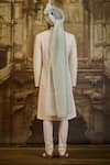 Nitika Gujral_Ivory Silk, Cotton Embroidery Raw Sherwani With Churidar _Online_at_Aza_Fashions