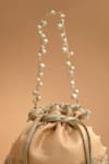 Amyra_Peach Cut Work, Pearls, Tassels, Lace Geet Brocade Embellished Potli - _Online_at_Aza_Fashions