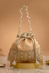Buy_Amyra_Peach Cut Work, Pearls, Tassels, Lace Geet Brocade Embellished Potli - _at_Aza_Fashions