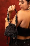 Buy_Amyra_Black Beads, Tassels, Embroidery, Fringe Tilora Mini Potli - _at_Aza_Fashions