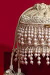Shop_Amyra_Ivory Pearls, Cut Work, Sequins, Embroidery, Tassels Anahi Brocade Mini Potli - _Online_at_Aza_Fashions