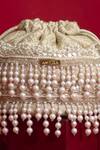 Buy_Amyra_Ivory Pearls, Cut Work, Sequins, Embroidery, Tassels Anahi Brocade Mini Potli - _Online