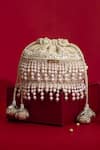 Amyra_Ivory Pearls, Cut Work, Sequins, Embroidery, Tassels Anahi Brocade Mini Potli - _Online_at_Aza_Fashions