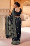 Shop_Naintara Bajaj_Black Silk, Brocade Zari Sweetheart Neck Flower Woven Saree With Blouse _at_Aza_Fashions