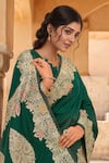 Samyukta Singhania_Green Brocade, Silk Zari, Tassels Flora Pattern Saree With Sleeveless Blouse _at_Aza_Fashions