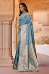 Buy Naintara Bajaj Blue Brocade, Silk Zari Boat Neck Floret Woven Saree With Blouse Buy_Naintara Bajaj_Blue Brocade, Silk Zari Boat Neck Floret Woven Saree With Blouse