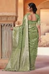 Shop Naintara Bajaj Green Silk, Brocade Zari Square Neck Blossom Woven Saree With Blouse at Aza Fashions Shop_Naintara Bajaj_Green Silk, Brocade Zari Square Neck Blossom Woven Saree With Blouse _at_Aza_Fashions