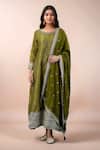 Buy_Naintara Bajaj_Olive Green Muslin, Jacquard Embroidery, Zari, Butti Pattern Flared Kurta Set _at_Aza_Fashions