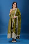Naintara Bajaj_Olive Green Muslin, Jacquard Embroidery, Zari, Butti Pattern Flared Kurta Set _Online_at_Aza_Fashions