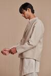 Saphed_Off White Linen Undyed Bandhgala Jacket _at_Aza_Fashions