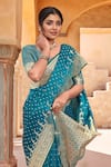 Buy_Samyukta Singhania_Turquoise Silk, Brocade Zari Sweetheart Neck Floral Woven Saree With Blouse _Online_at_Aza_Fashions