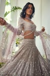 Buy_Isa By Dolly Wahal_Lilac Net Sequins, Pearls, Beads, Crystals, Embroidery Luna Lehenga Set _Online_at_Aza_Fashions