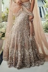Isa By Dolly Wahal_Gold Net Sequins, Beads, Crystals, Embroidery Walnut Fishcut Lehenga Set _at_Aza_Fashions