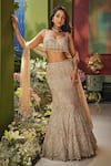 Buy_Isa By Dolly Wahal_Rose Gold Net Sequins, Crystals, Embroidery, Tassels Zara Work Lehenga Set _at_Aza_Fashions
