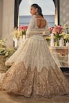 Shop_Isa By Dolly Wahal_Ivory Net Sequins, Crystals, Pearls, Embroidery, Ombre Gold Bridal Lehenga Set _at_Aza_Fashions