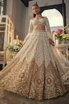 Buy_Isa By Dolly Wahal_Ivory Net Sequins, Crystals, Pearls, Embroidery, Ombre Gold Bridal Lehenga Set _at_Aza_Fashions