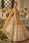 Buy_Isa By Dolly Wahal_Gold Net Sequins, Crystals, Beads, Embroidery Embellished Bridal Lehenga Set _Online_at_Aza_Fashions