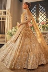 Shop_Isa By Dolly Wahal_Gold Net Sequins, Crystals, Beads, Embroidery Embellished Bridal Lehenga Set _Online_at_Aza_Fashions