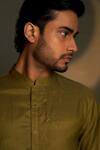 Shop_Charkhee_Olive Green Chanderi, Voile, Poplin Embroidery Mul Kurta With Pant _Online_at_Aza_Fashions