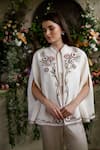 Buy_Nika 1.0_Ivory Mandarin Collar Ilana Hand Embroidered Cape _at_Aza_Fashions