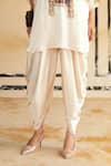 Rainas_Cream Satin Embroidery, Mirrors, Tassels Marusthal Muse Top And Dhoti Pant Set _at_Aza_Fashions