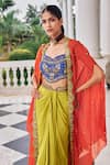Nidhika Shekhar_Orange Crepe, Silk Embroidery, Sequins, Stones Round Ullusat Cape And Skirt Set _at_Aza_Fashions