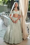 Buy_Roqa_Green Net Embroidery, Sequins, Beads V-neck Tajira Sea Bridal Lehenga Set _at_Aza_Fashions