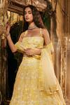 Shop_Varun Chakkilam_Yellow Satin, Organza Embroidery Square Neck Daisy Dew Lehenga Set _at_Aza_Fashions