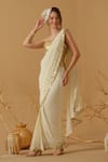 Buy_Abstract By Megha Jain Madaan_Gold Silk, Crepe, Jersey, Cotton Pre-draped Saree With Embellished Corset _at_Aza_Fashions