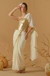 Buy_Abstract By Megha Jain Madaan_Gold Silk, Crepe, Jersey, Cotton Pre-draped Saree With Embellished Corset _at_Aza_Fashions