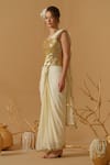 Abstract By Megha Jain Madaan_Gold Silk, Crepe, Jersey, Cotton Pre-draped Saree With Embellished Corset _at_Aza_Fashions