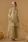 Buy_Abstract By Megha Jain Madaan_Gold Georgette, Tissue, Tulle Embroidery, Sequins, Beads, Ruffles Yoke Kurta Set _at_Aza_Fashions