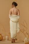 Shop_Abstract By Megha Jain Madaan_Ivory Silk, Crepe, Jersey Sequins Embellished Border Pre-draped Saree _at_Aza_Fashions