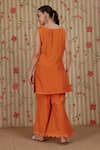 Shop_Nitisha Kashyap Official_Orange Silk, Net Embroidery, Sequins, Sleeveless Kurta Bell Bottom Pant Set _at_Aza_Fashions