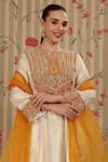 Buy_Nitisha Kashyap Official_Off White Georgette, Organza Embroidery, Sequins, A-line Kurta Tulip Pant Set _Online_at_Aza_Fashions
