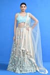 Buy_Sayisha_Beige Net Applique, Embroidery, Sequins, Fabric Flowers Floral Lehenga Set _at_Aza_Fashions
