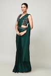 Sayisha_Green Chinon, Net Embroidery, Sequins V-neck Pre-draped Saree With V Blouse _at_Aza_Fashions