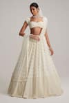 Buy_Vvani By Vani Vats_Off White Organza, Georgette, Net Mirrors, And Drop Bridal Lehenga Set With Veil _at_Aza_Fashions