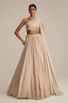 Buy_Vvani By Vani Vats_Beige Satin Pearls, Tassels One Shoulder Light Lehenga Set _at_Aza_Fashions