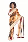 Buy_ISADAA BY ROTNA DUTT_Cream Georgette Digital Floral Print Saree With Satin Border _at_Aza_Fashions